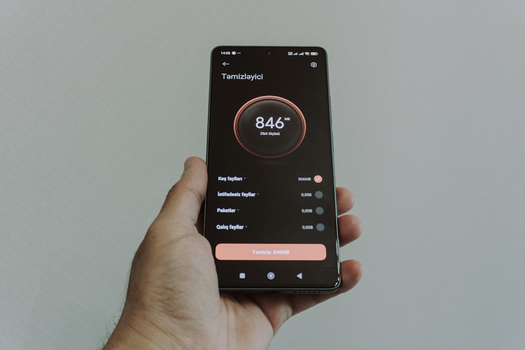 hand-holding-smartphone-displaying-a-health-application-s-yxjc7cdqc